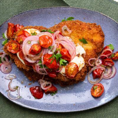 Steak Parmesan with roasted tomato salsa