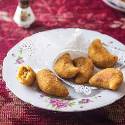 Half-moons with chicken and cheese filling