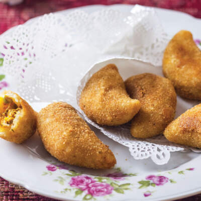 Half-moons with chicken and cheese filling