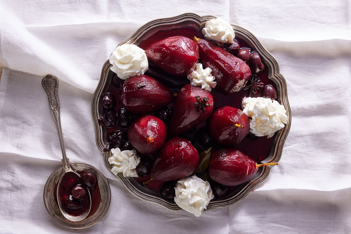 Cherry-stained poached pears