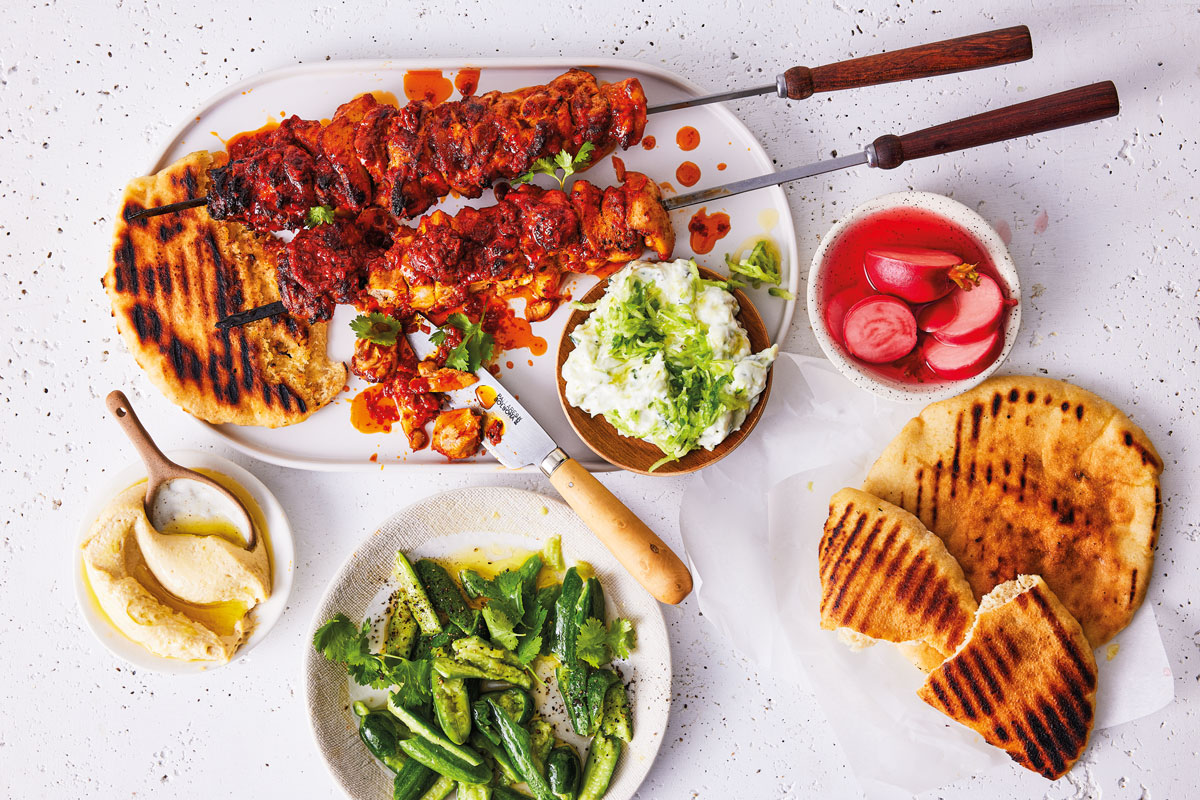 GRILLED HARISSA-AND-YOGHURT CHICKEN IN PITA BREADS