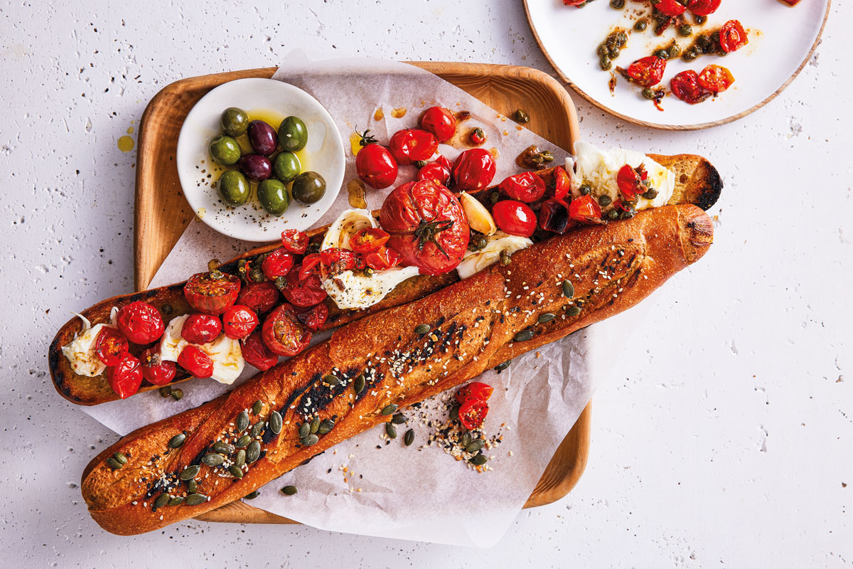 GRILLED PUTTANESCA- INSPIRED CAPRESE SEED BREAD TOAST