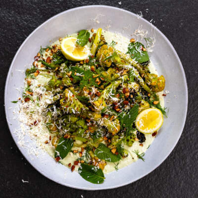 Harissa-roasted broccoli with herby feta yoghurt