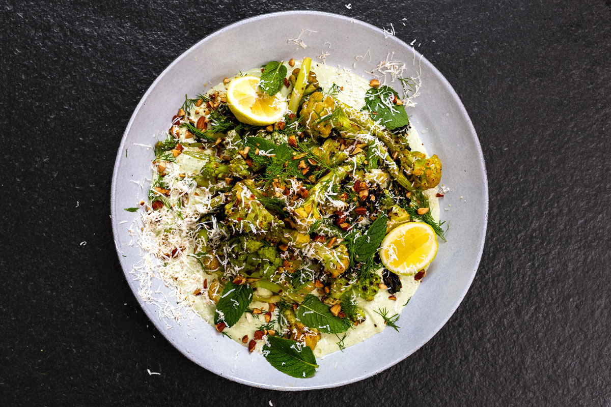 Harissa-roasted broccoli with herby feta yoghurt