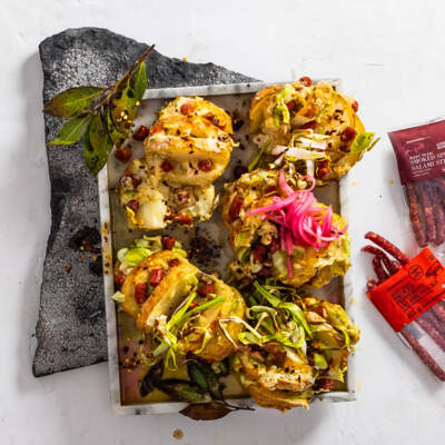 Salami-stuffed baked potatoes