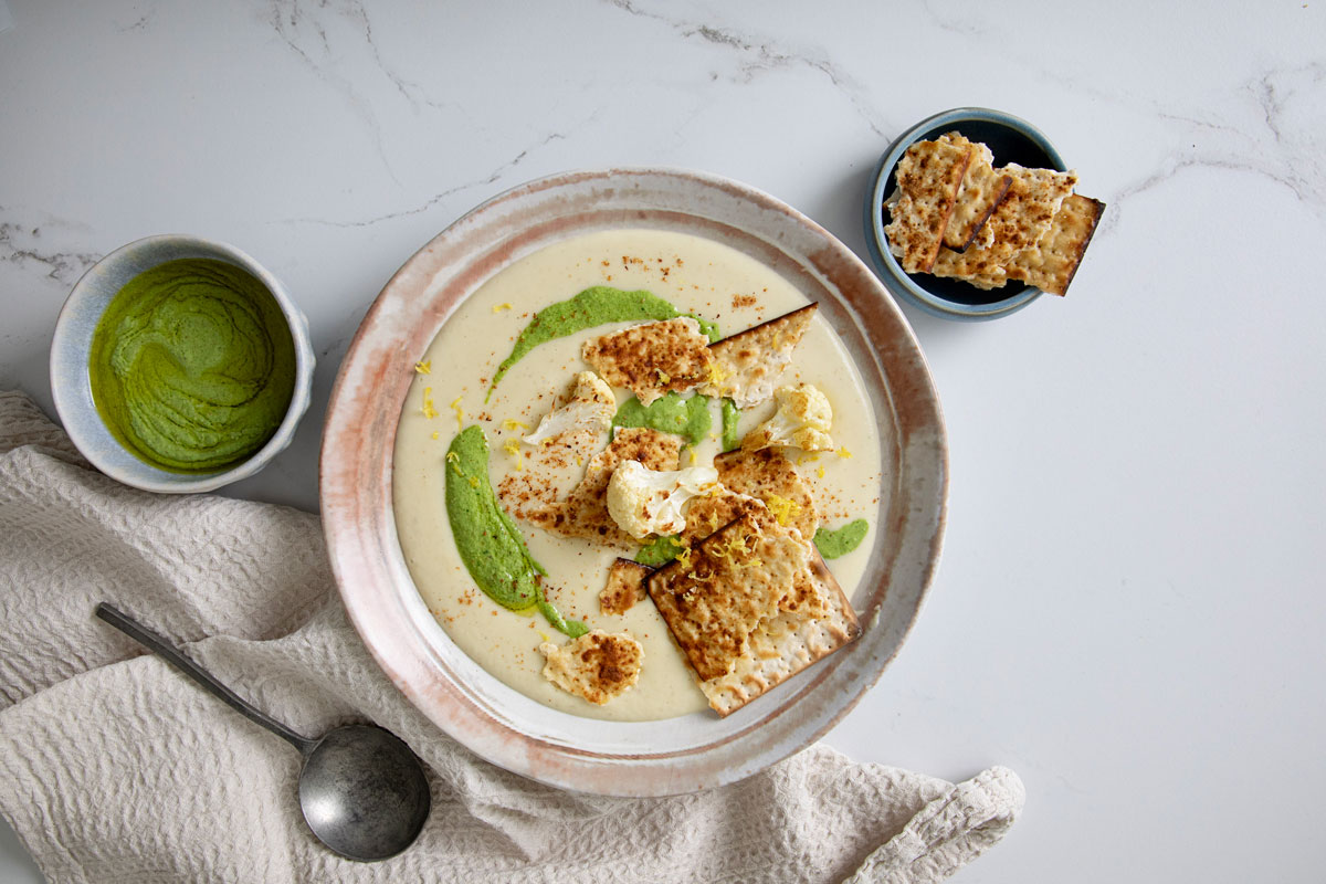Creamy cauliﬂower soup with matzah croutons